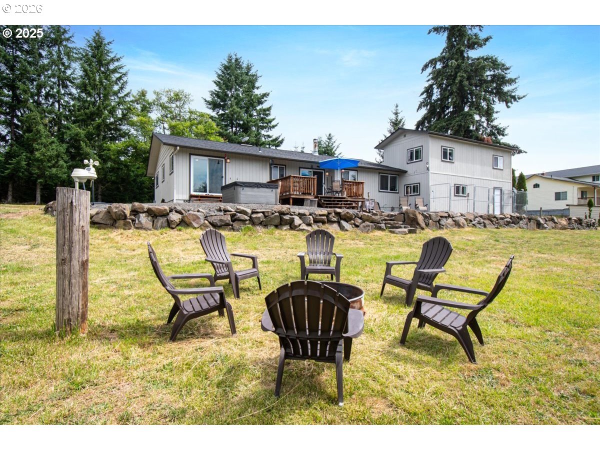 1415 Sightly Road Toutle, WA 98649 - Photo 32 of 36 a view of a swimming pool with a lounge chairs