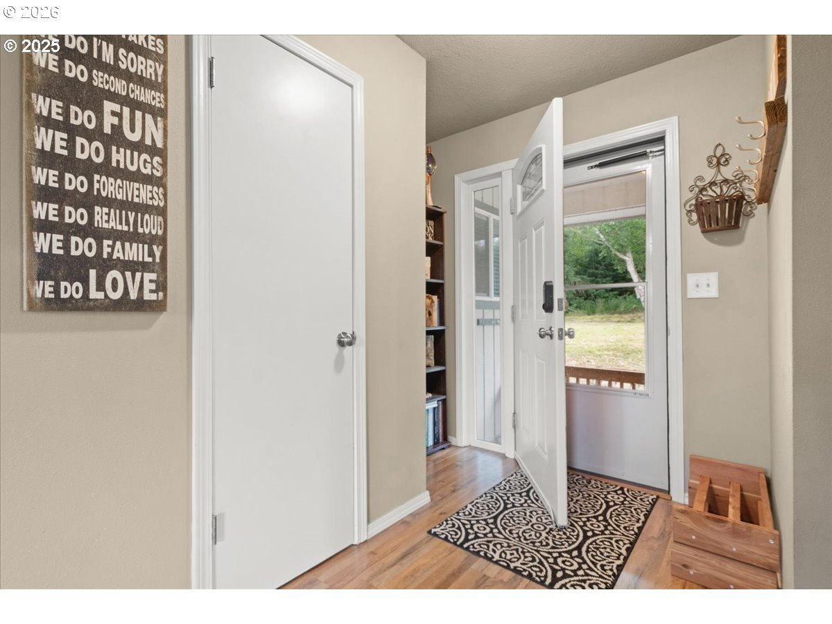 1415 Sightly Road Toutle, WA 98649 - Photo 5 of 36 a view of entryway with wooden floor