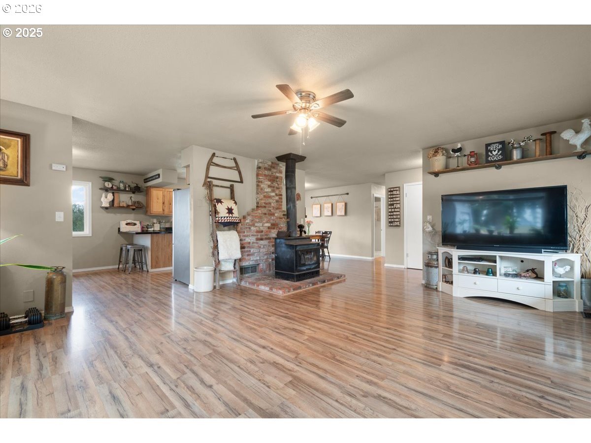 1415 Sightly Road Toutle, WA 98649 - Photo 6 of 36 a living room with furniture and a flat screen tv