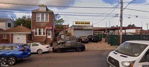 994 Remsen Avenue Brooklyn, NY 11236 - Photo 2 of 9 a view of a cars park in front of building
