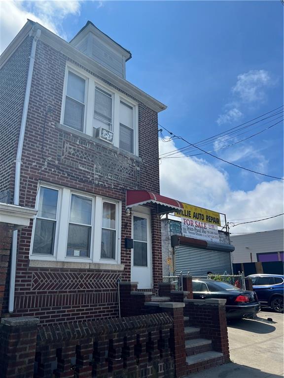 994 Remsen Avenue Brooklyn, NY 11236 - Photo 3 of 9 a front view of a building with entryway