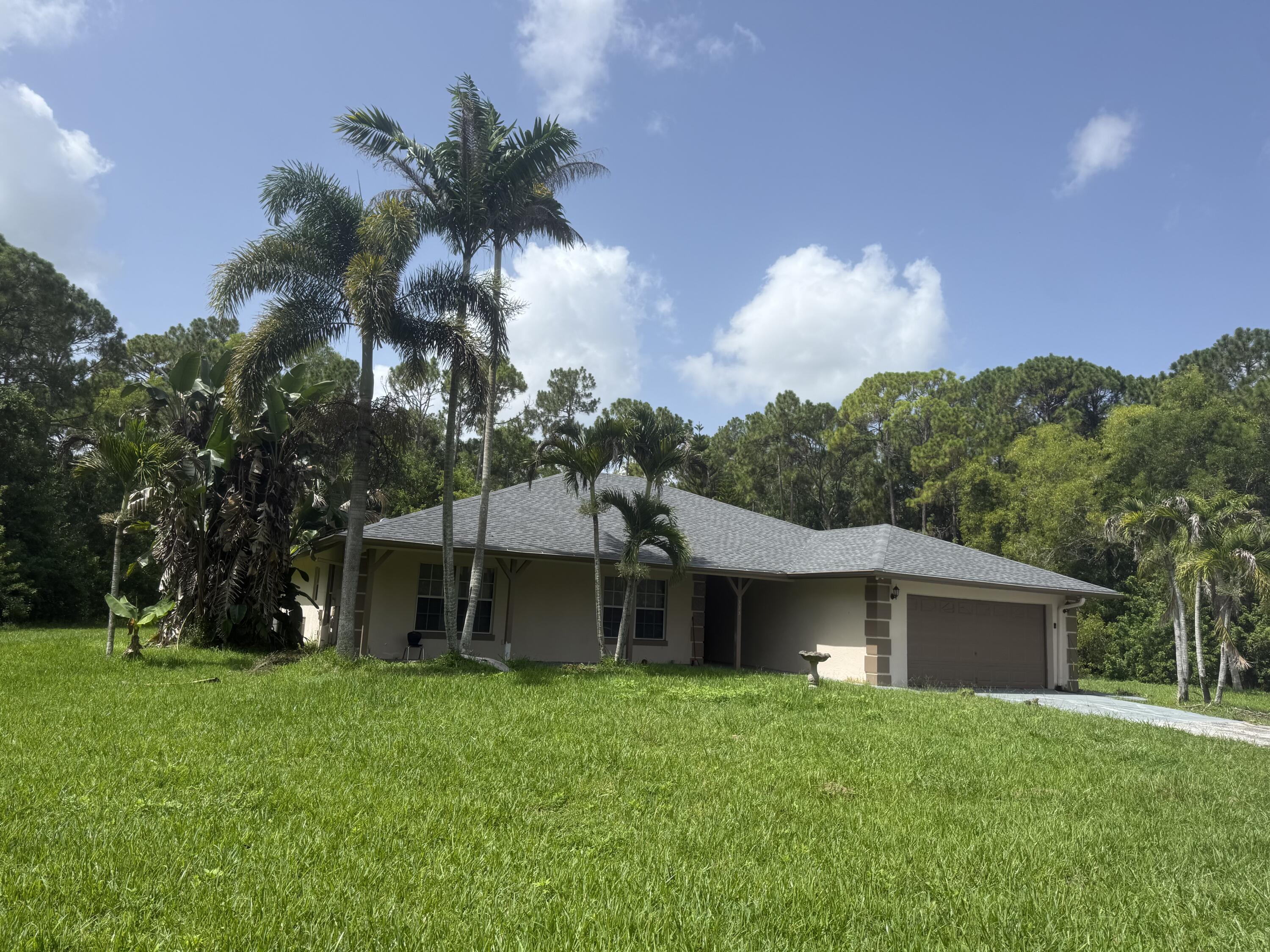 13338 76th Road North The Acreage, FL 33412 - Photo 1 of 12 Front of Structure
