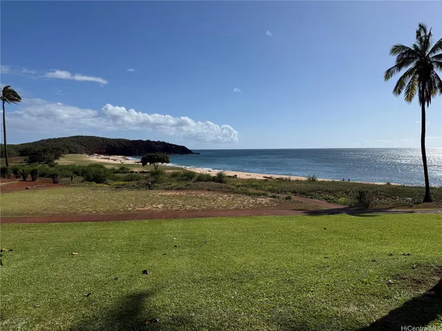 a spacious bedroom with a bed and a couch