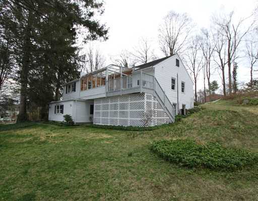 198 Valley Road Cos Cob, CT 06807 - Photo 11 of 11 a view of a house with a yard