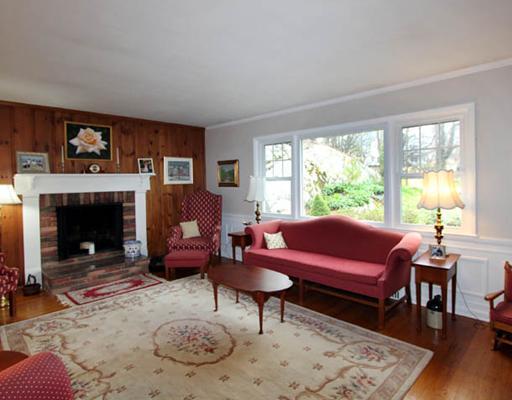 198 Valley Road Cos Cob, CT 06807 - Photo 2 of 11 a living room with furniture and a fireplace