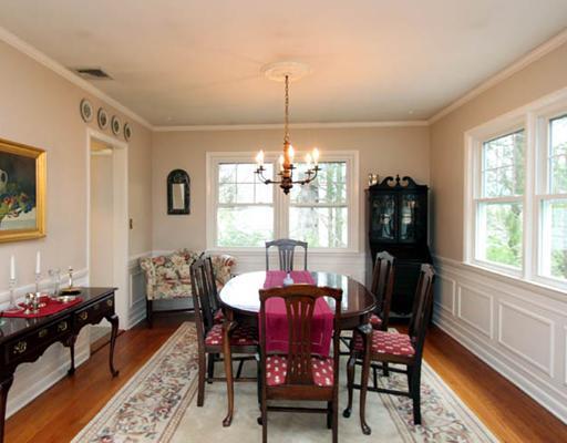 198 Valley Road Cos Cob, CT 06807 - Photo 3 of 11 a dining room with furniture a chandelier and window
