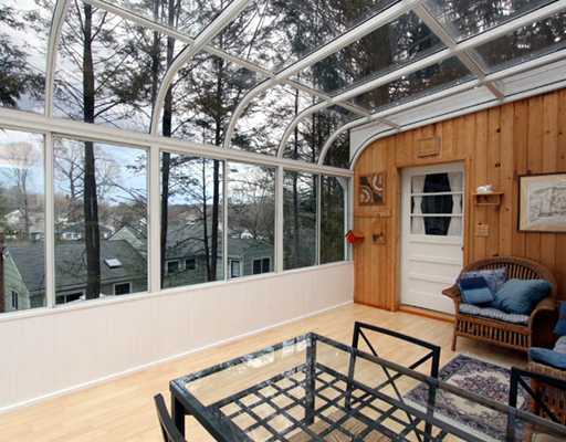 198 Valley Road Cos Cob, CT 06807 - Photo 6 of 11 a balcony with table and chairs
