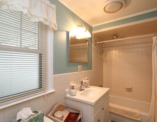 198 Valley Road Cos Cob, CT 06807 - Photo 8 of 11 a bathroom with a sink vanity granite tub and shower