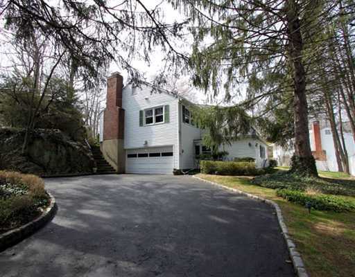 198 Valley Road Cos Cob, CT 06807 - Photo 10 of 11 a white house that has a tree in front of it