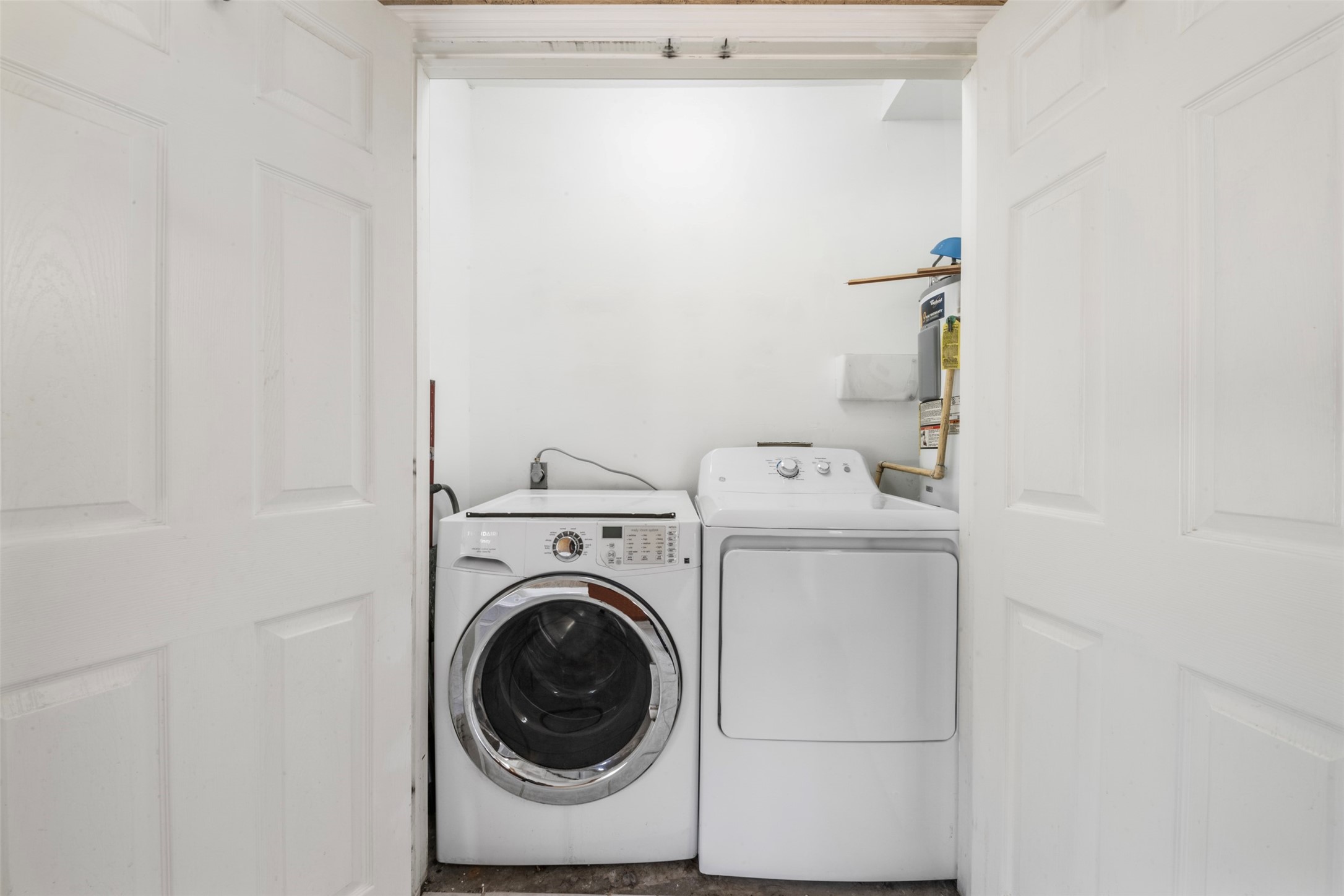 33349 Interstate 10 Hankamer, TX 77560 - Photo 16 of 28 a utility room with dryer and washer