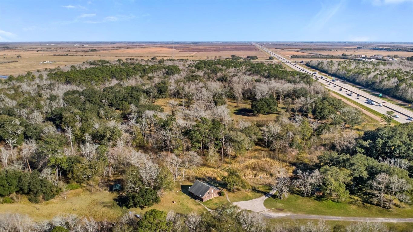 33349 Interstate 10 Hankamer, TX 77560 - Photo 25 of 28 a view of a city with an ocean beach