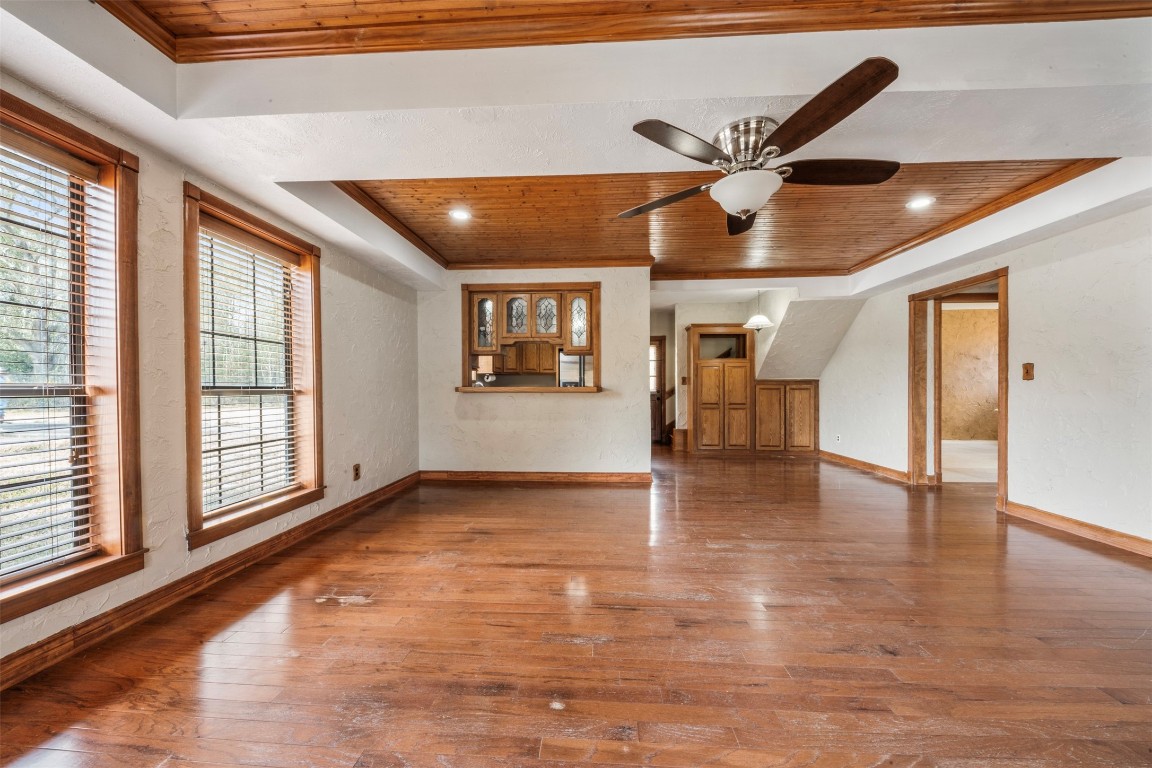 33349 Interstate 10 Hankamer, TX 77560 - Photo 6 of 28 a view of an empty room with window and wooden floor