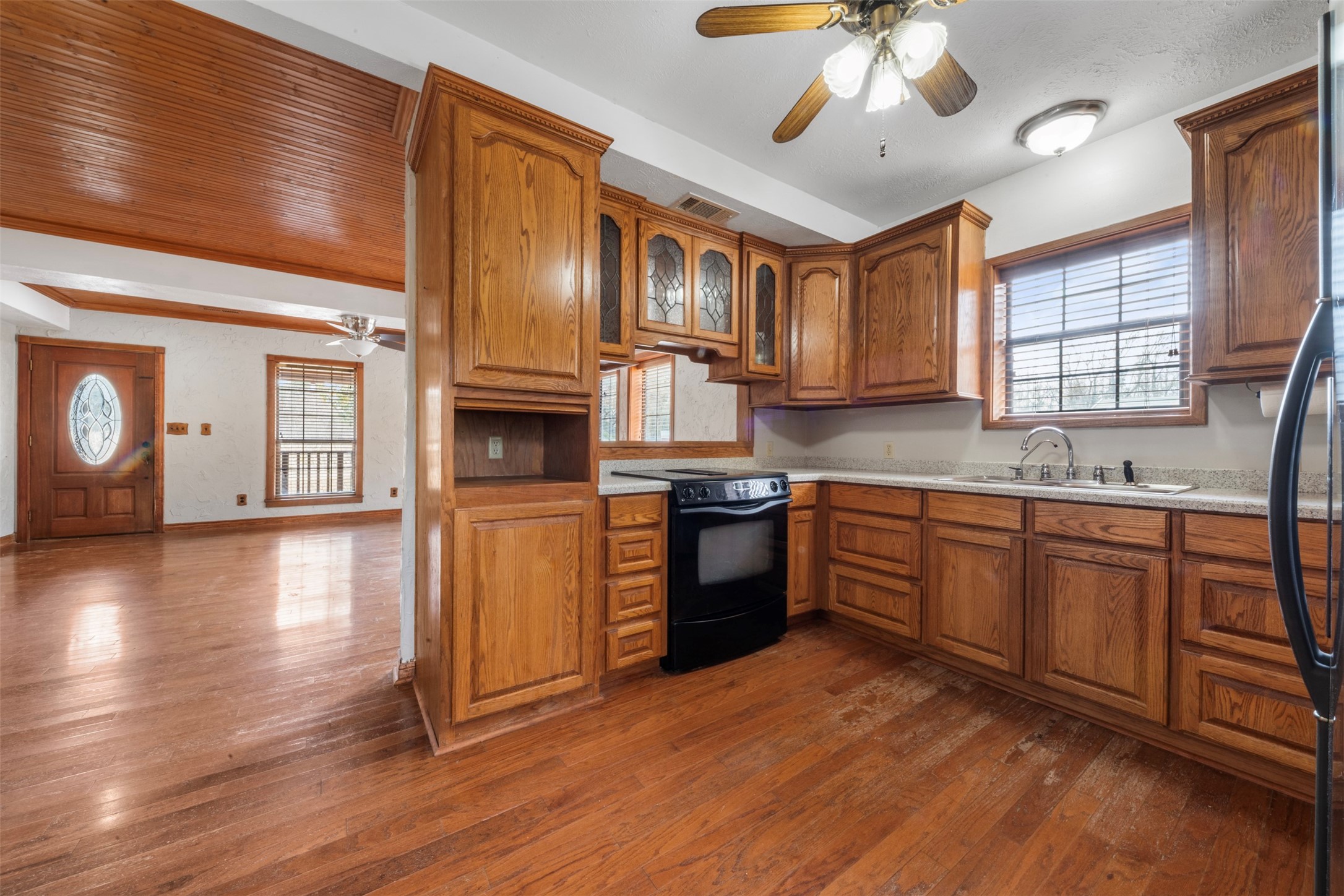 33349 Interstate 10 Hankamer, TX 77560 - Photo 9 of 28 a kitchen with stainless steel appliances granite countertop a sink cabinets and wooden floor