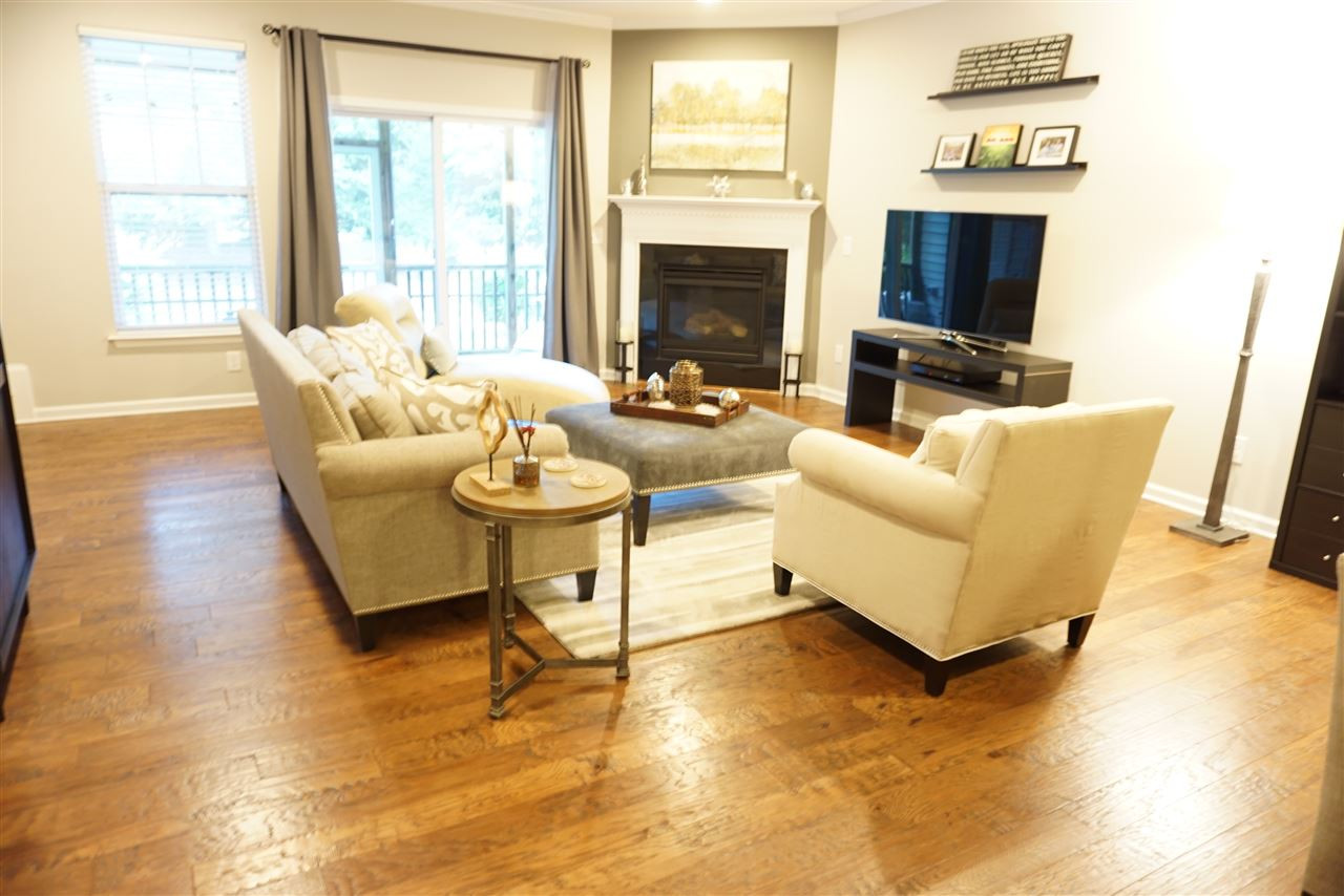 2411 Memory Ridge Drive Raleigh, NC 27606 - Photo 8 of 25 Lovely living room with pretty fireplace, gas logs.