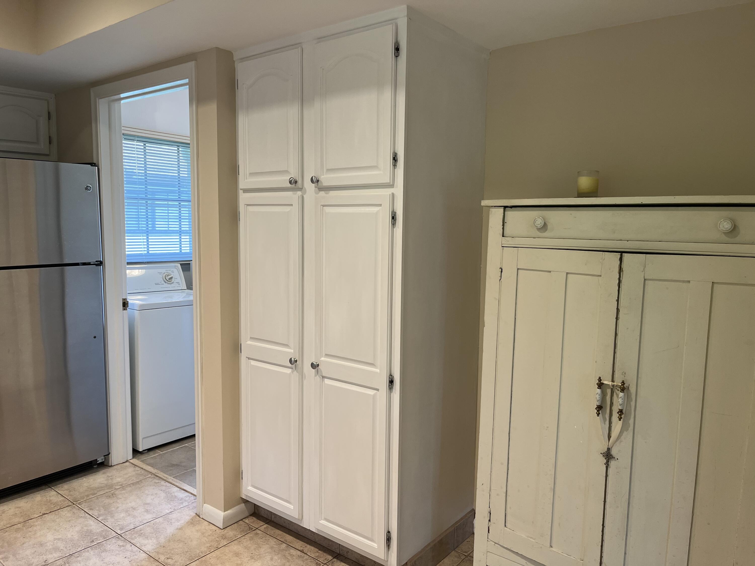 493 Forestview Drive Atlantis, FL 33462 - Photo 15 of 21 a view of a closet