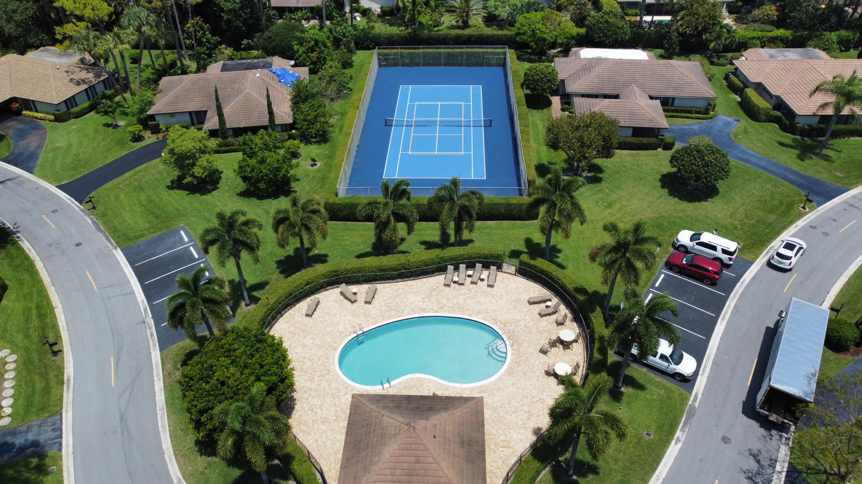 493 Forestview Drive Atlantis, FL 33462 - Photo 3 of 21 an aerial view of a house having yard