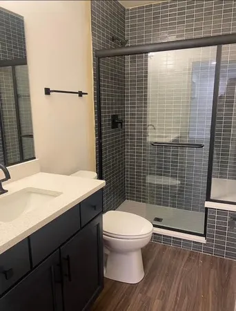 a bathroom with a sink and a toilet
