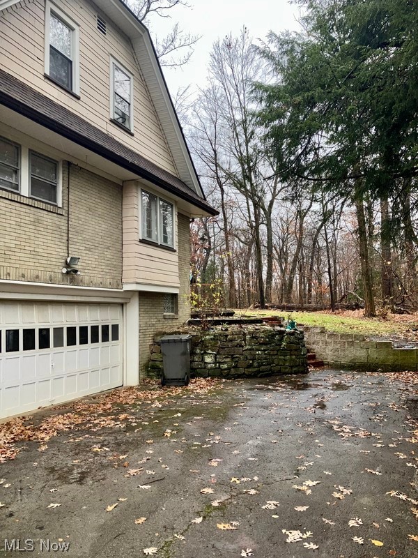 2108 Volney Road Youngstown, OH 44511 - Photo 25 of 27 View of home's exterior with a garage