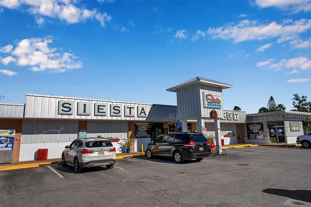 a view of store with a lot of signs