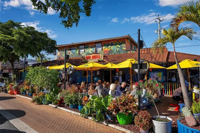 a view of a street with cars