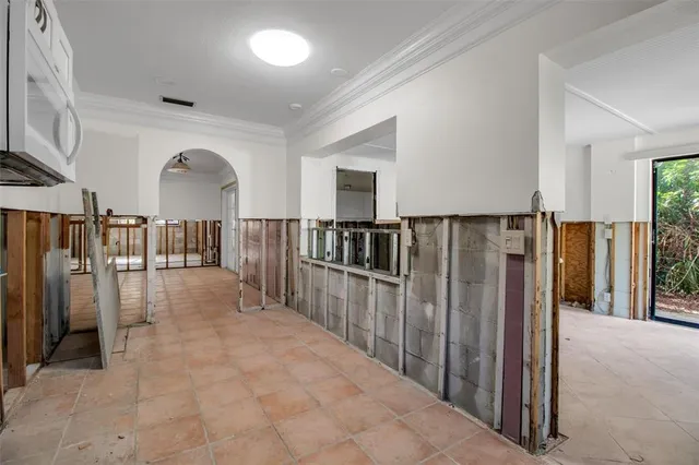 a view of hallway with wooden floor