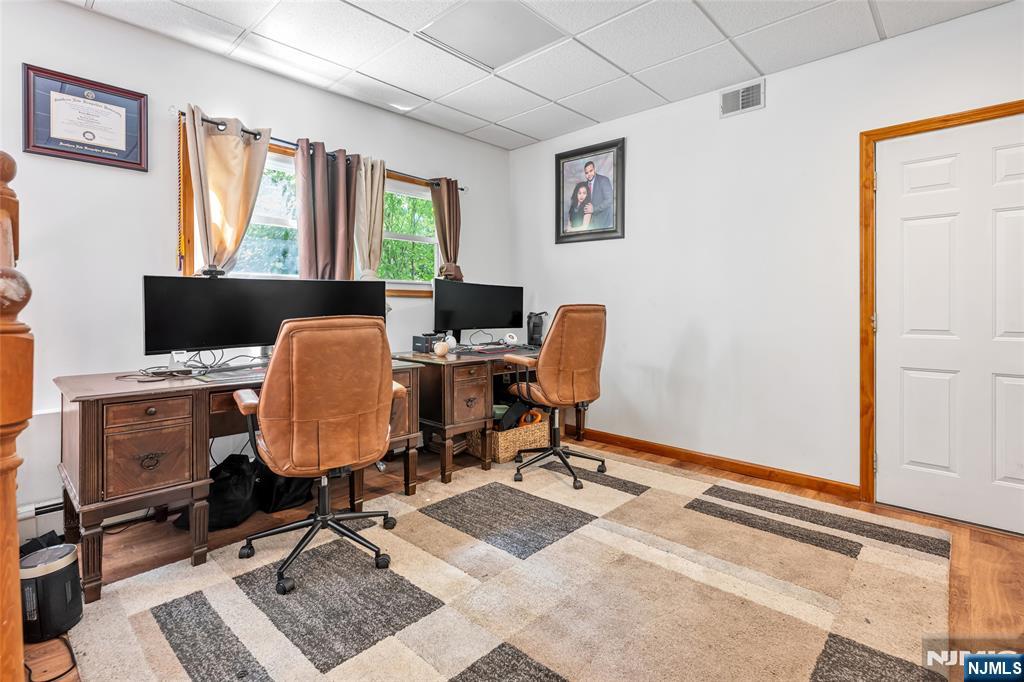 21 Marcia Road Ringwood, NJ 07456 - Photo 25 of 42 a view of a workspace with furniture and a window