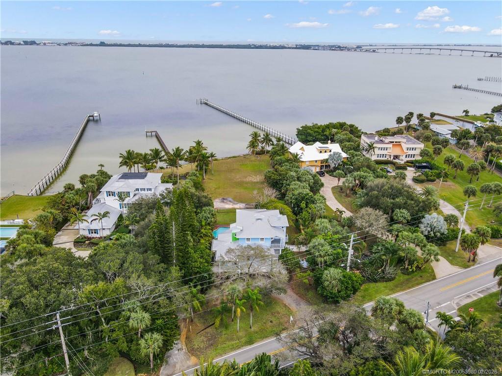 94 North Sewalls Point Road Stuart, FL 34996 - Photo 26 of 35 an aerial view of a house with a lake view