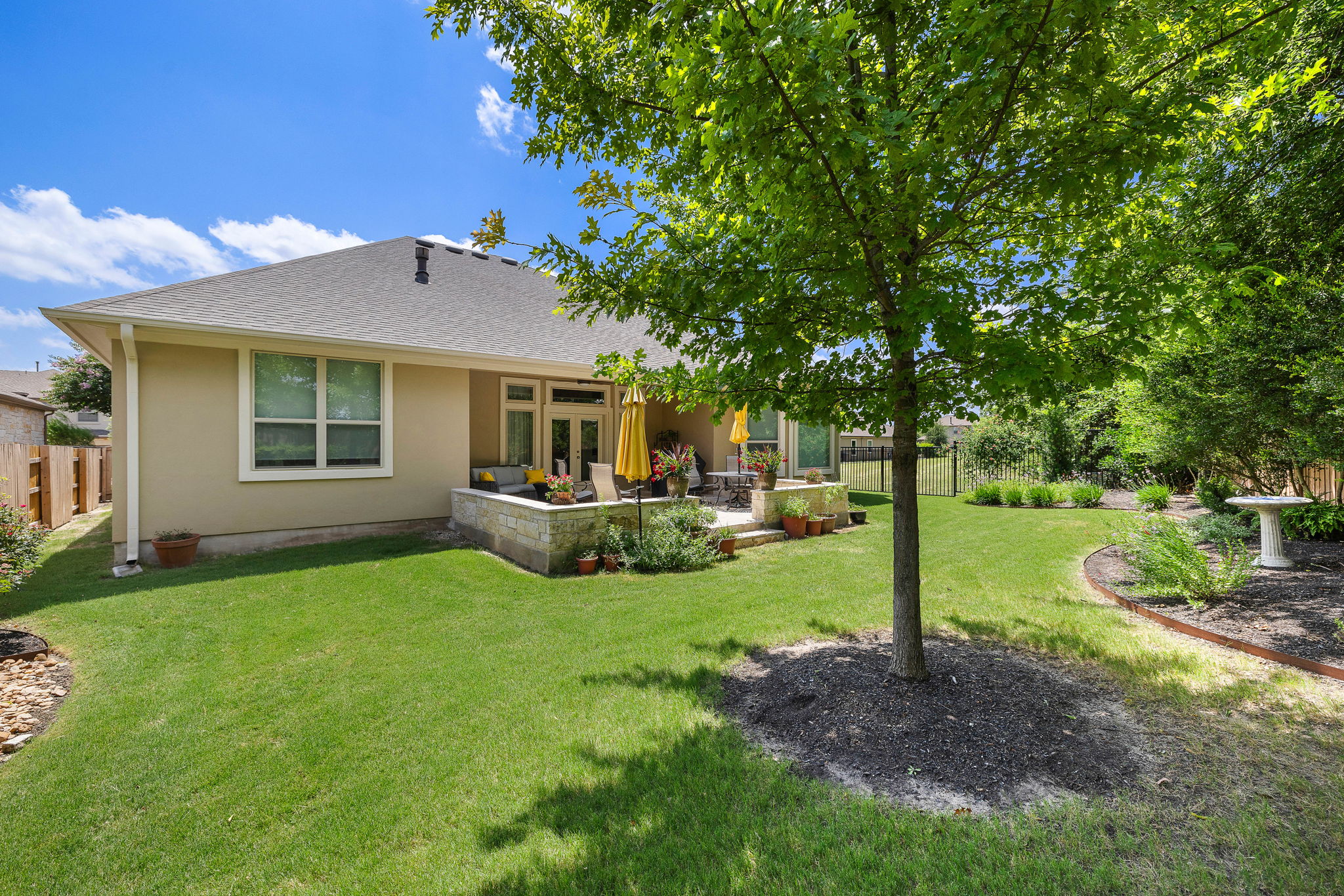 5016 Yucca Flower Lane Georgetown, TX 78626 - Photo 28 of 31 a view of a house with a backyard