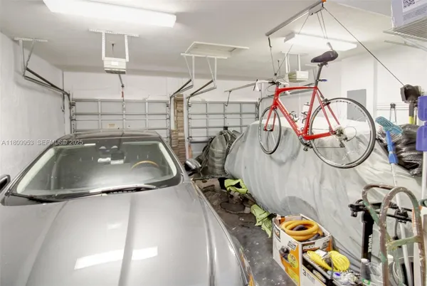 a bathroom with a sink and white walls