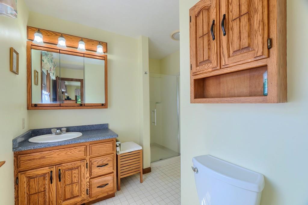 195 Sterling Road Princeton, MA 01541 - Photo 34 of 39 a bathroom with a sink and a mirror