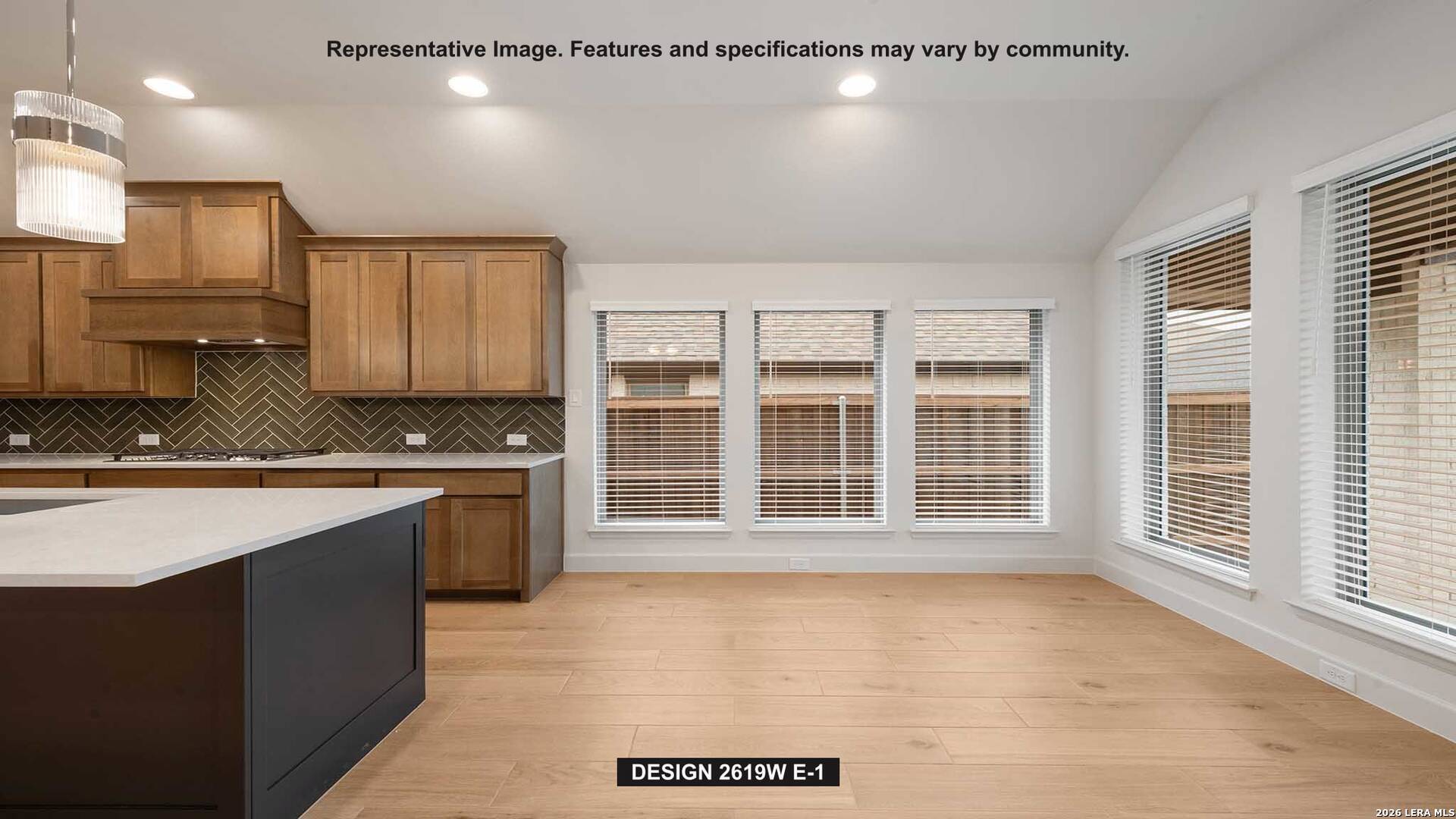 323 Bella Rosa Way Cibolo, TX 78108 - Photo 7 of 15 a large kitchen with stainless steel appliances granite countertop a stove a sink and a granite counter tops