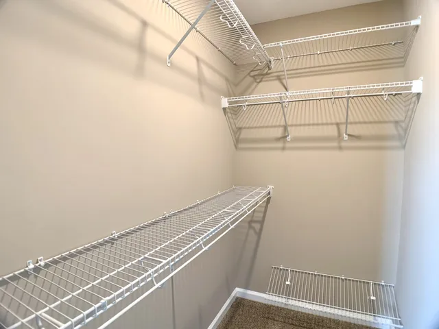 a view of a room with racks on the wall