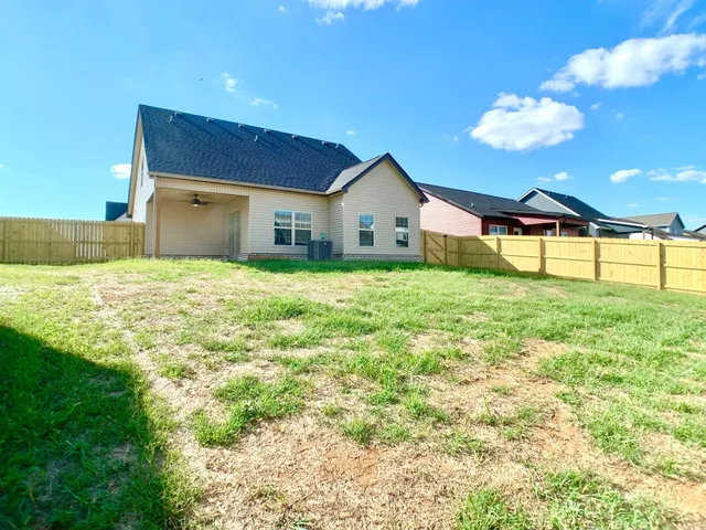 a house view with a garden space