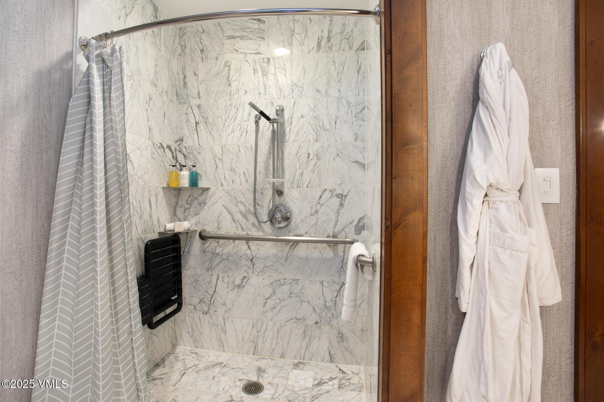 100 Bachelor Ridge Road, Unit 3314 Avon, CO 81620 - Photo 16 of 58 a bathroom with a shower and a shower curtain
