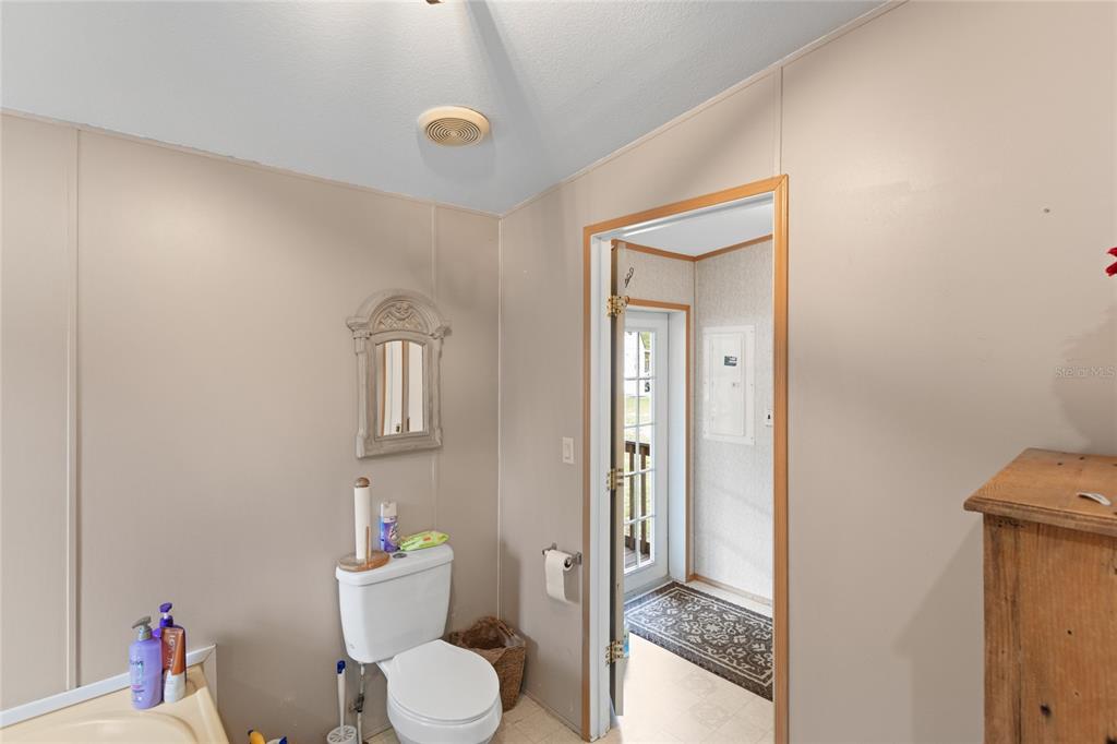 5670 Acadia Street Keystone Heights, FL 32656 - Photo 39 of 65 a bathroom with a toilet
