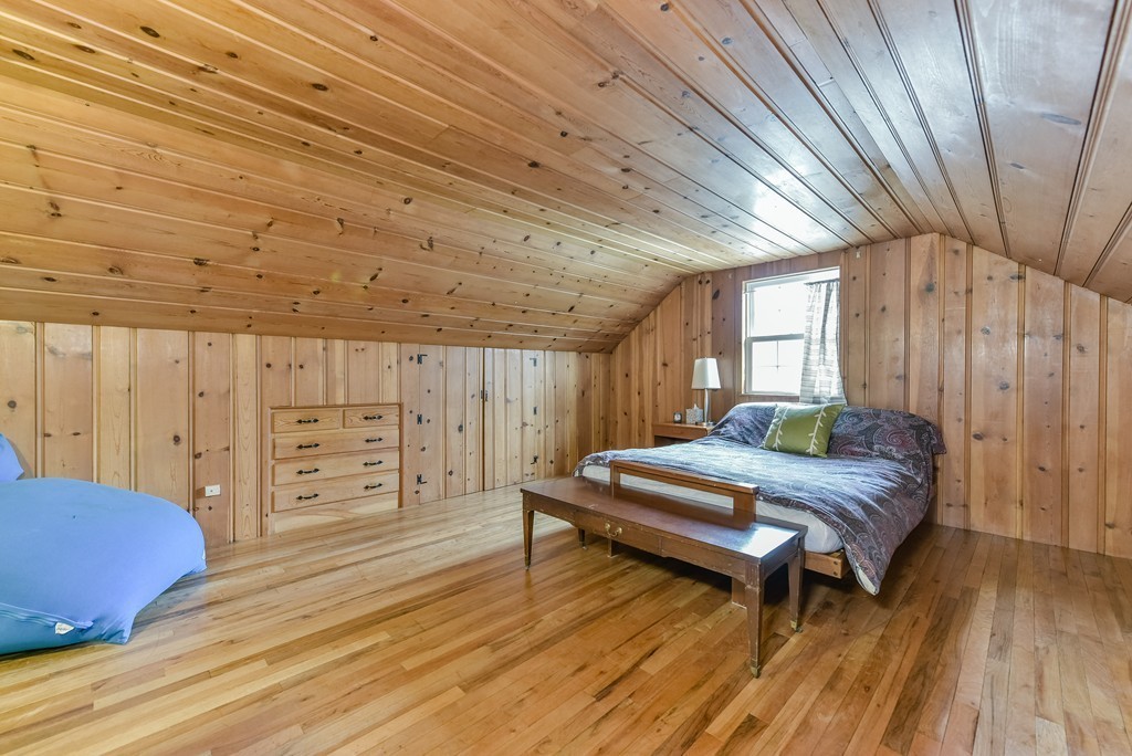 460 Brook Road Milton, MA 02186 - Photo 12 of 14 a bedroom with furniture and wooden floor