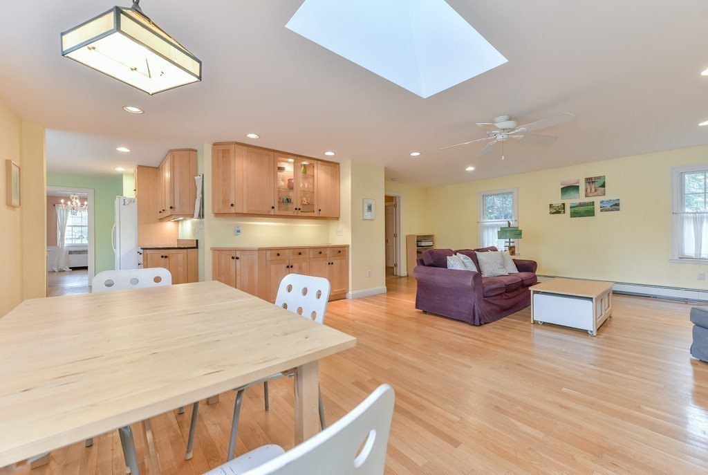 460 Brook Road Milton, MA 02186 - Photo 6 of 14 a living room with furniture and a kitchen view