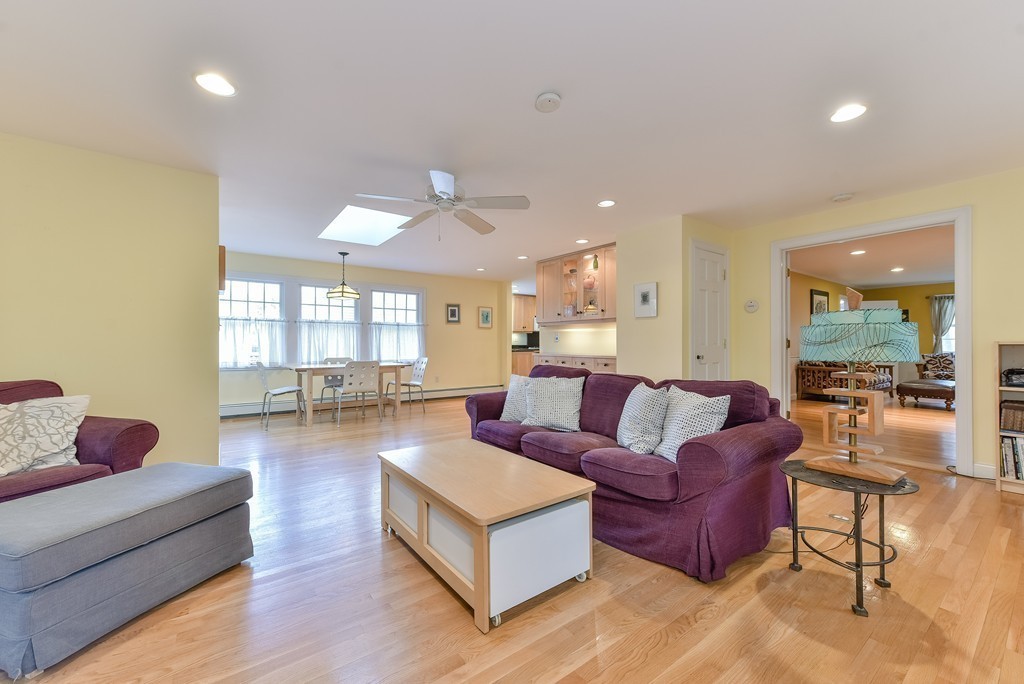 460 Brook Road Milton, MA 02186 - Photo 7 of 14 a living room with furniture and a wooden floor