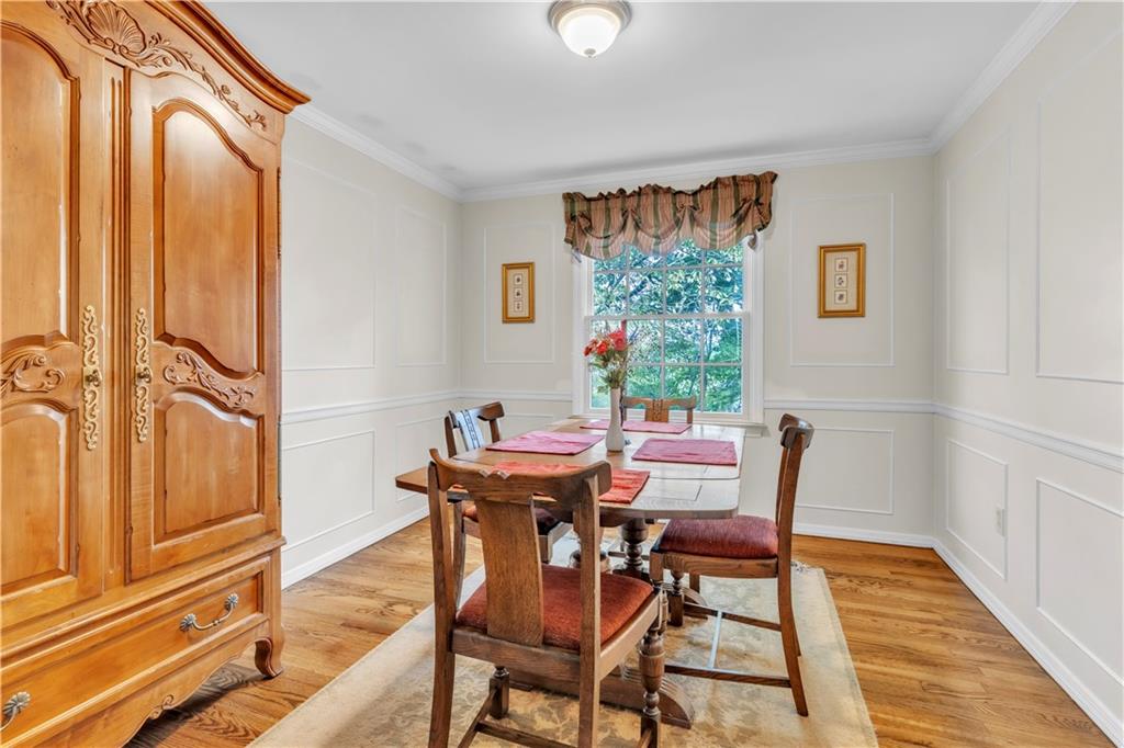 5100 West Harbison Road Pittsburgh, PA 15205 - Photo 20 of 49 Formal dining room featuring overhead lighting and continued neutral paint & hardwoods!