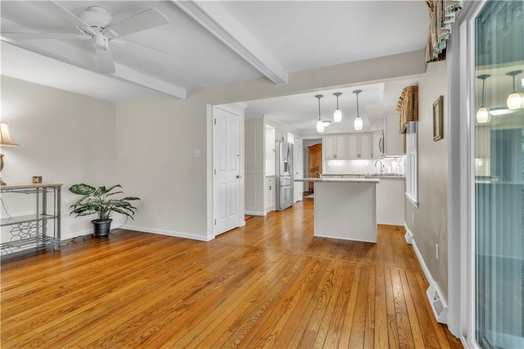 5100 West Harbison Road Pittsburgh, PA 15205 - Photo 9 of 49 Hardwoods & beamed ceiling charm the space!