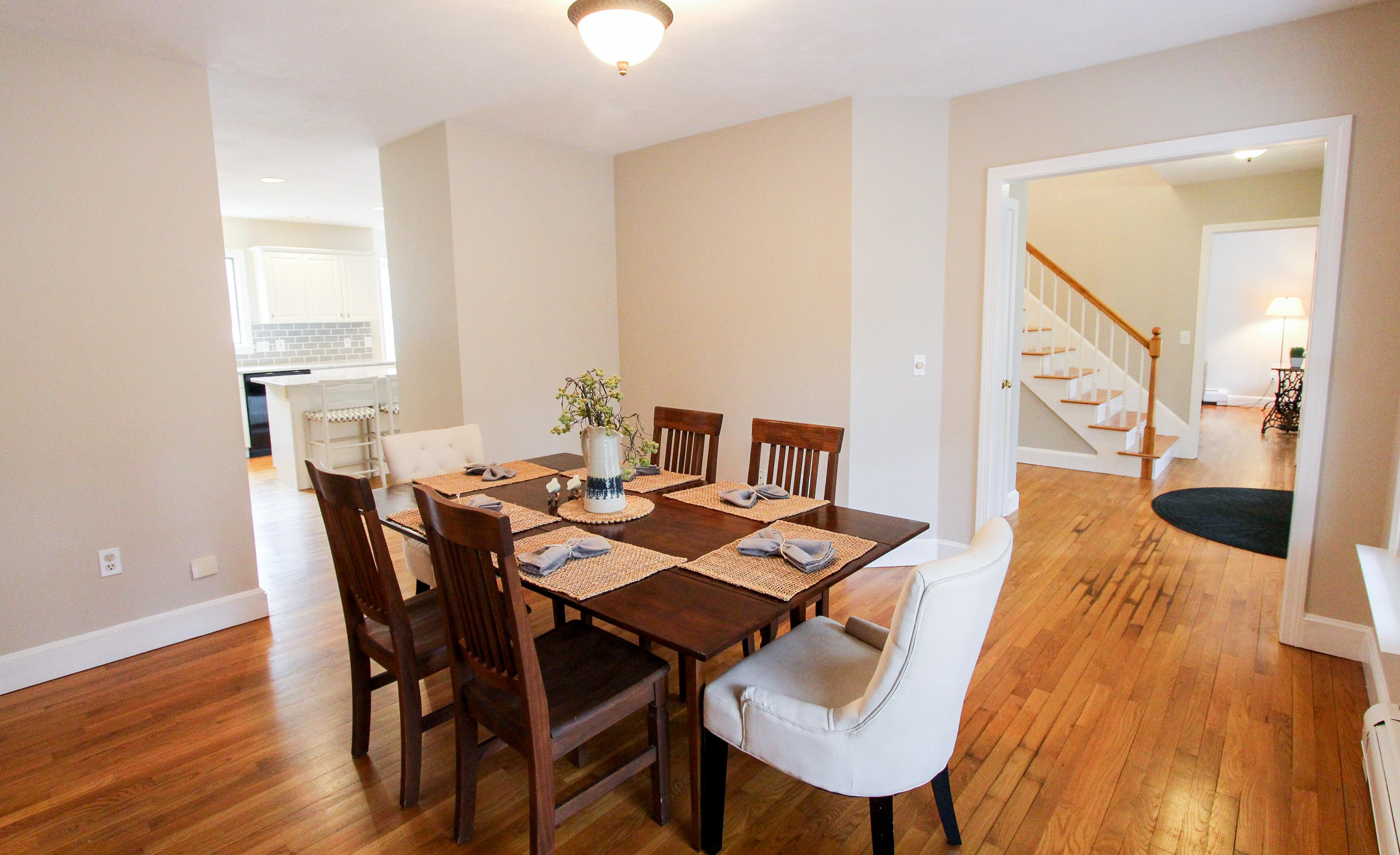 29 Schooner Drive Cotuit, MA 02635 - Photo 10 of 35 a view of a dining room with furniture and wooden floor