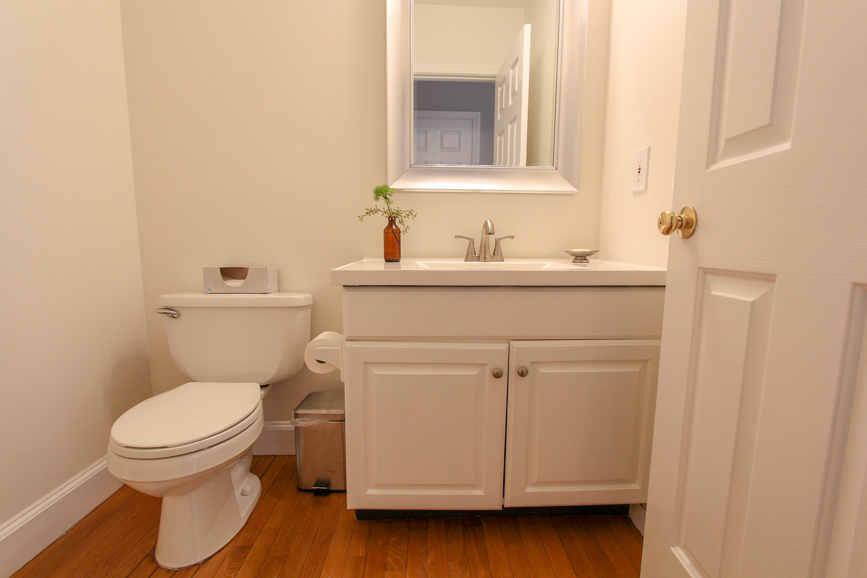 29 Schooner Drive Cotuit, MA 02635 - Photo 19 of 35 a bathroom with a toilet sink and mirror