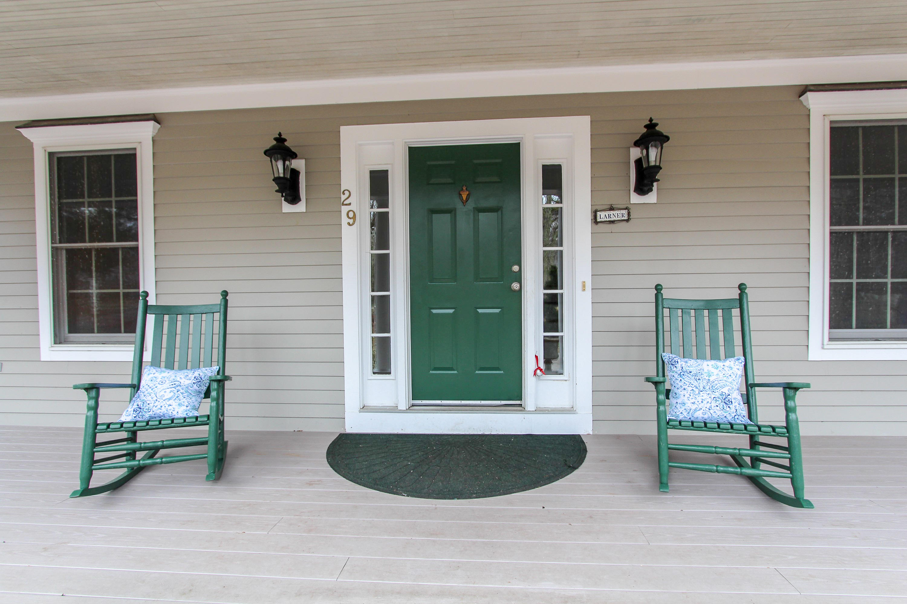 29 Schooner Drive Cotuit, MA 02635 - Photo 2 of 35 a backyard of a house with barbeque oven fire pit and couch
