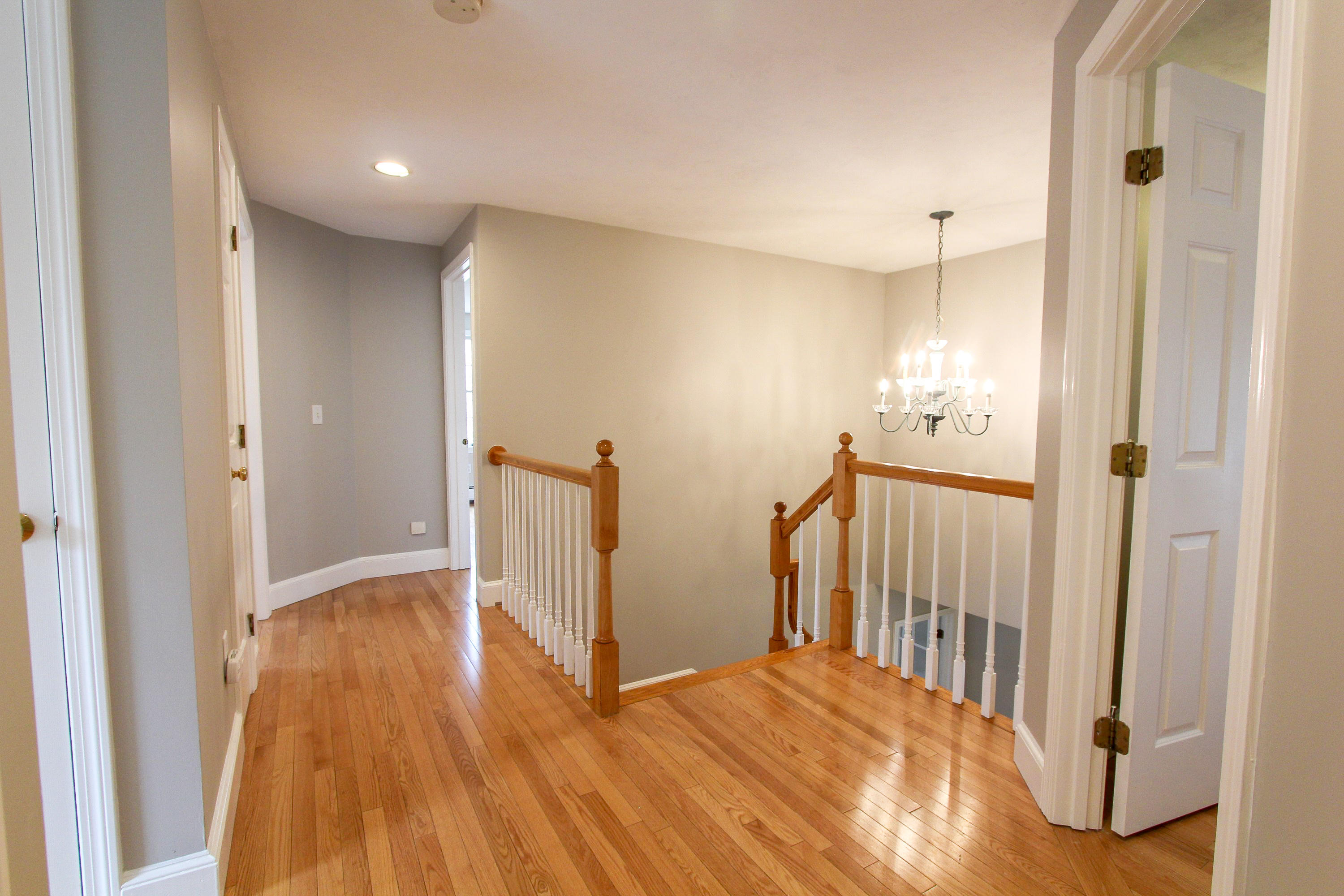 29 Schooner Drive Cotuit, MA 02635 - Photo 20 of 35 a view of a hallway with wooden floor
