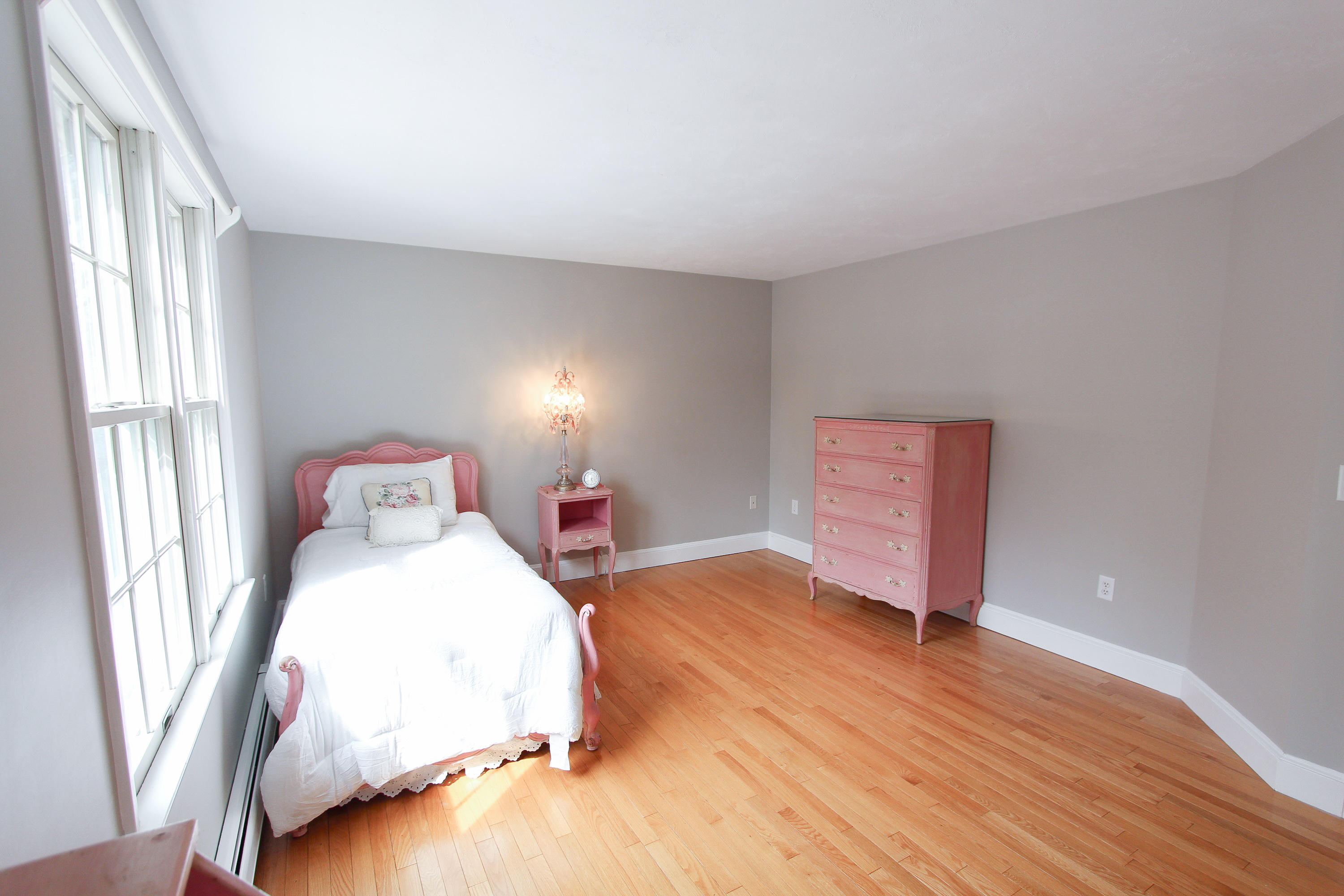 29 Schooner Drive Cotuit, MA 02635 - Photo 27 of 35 a bedroom with a bed and a window