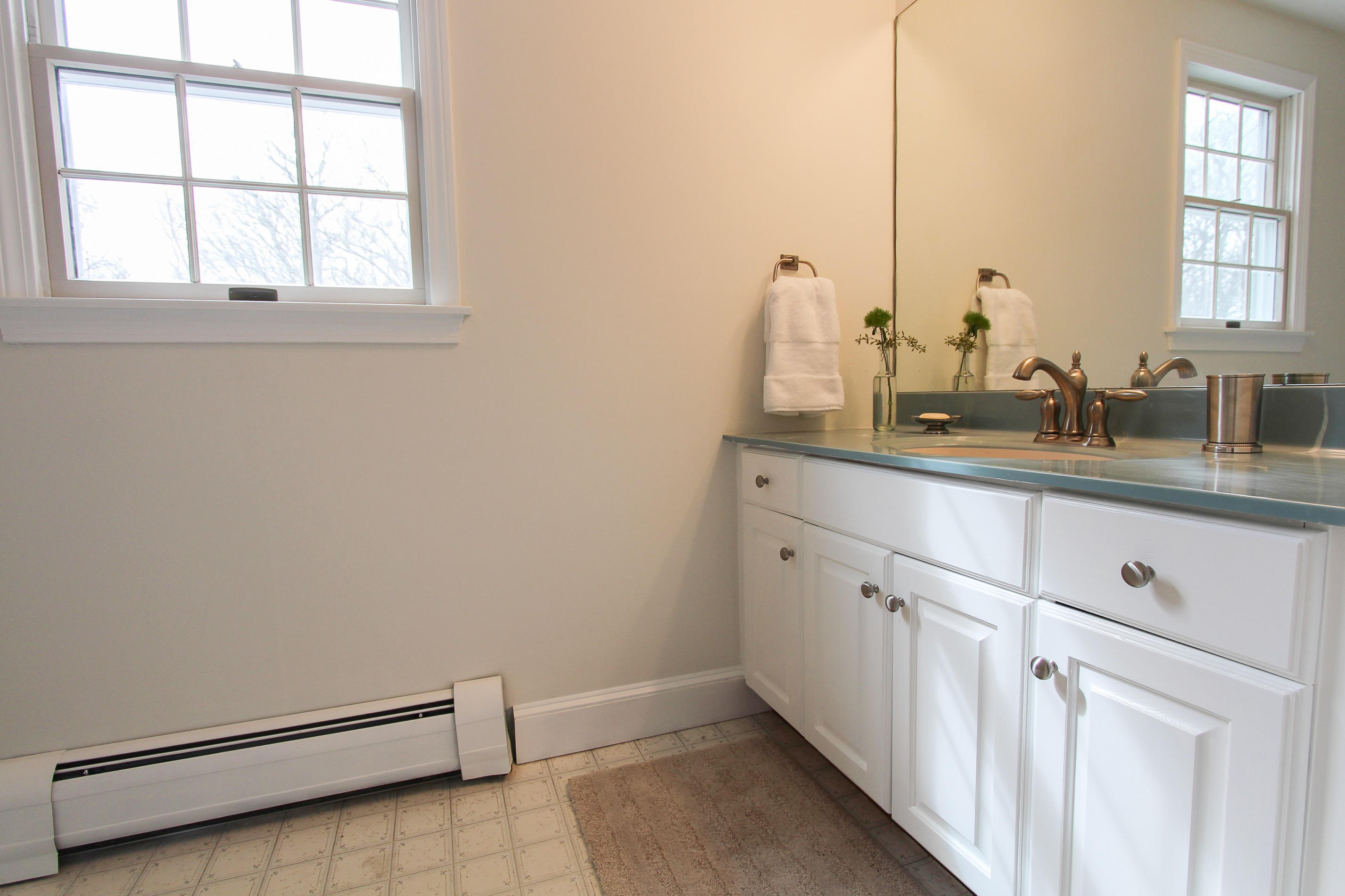 29 Schooner Drive Cotuit, MA 02635 - Photo 28 of 35 a view of a kitchen with sink and window