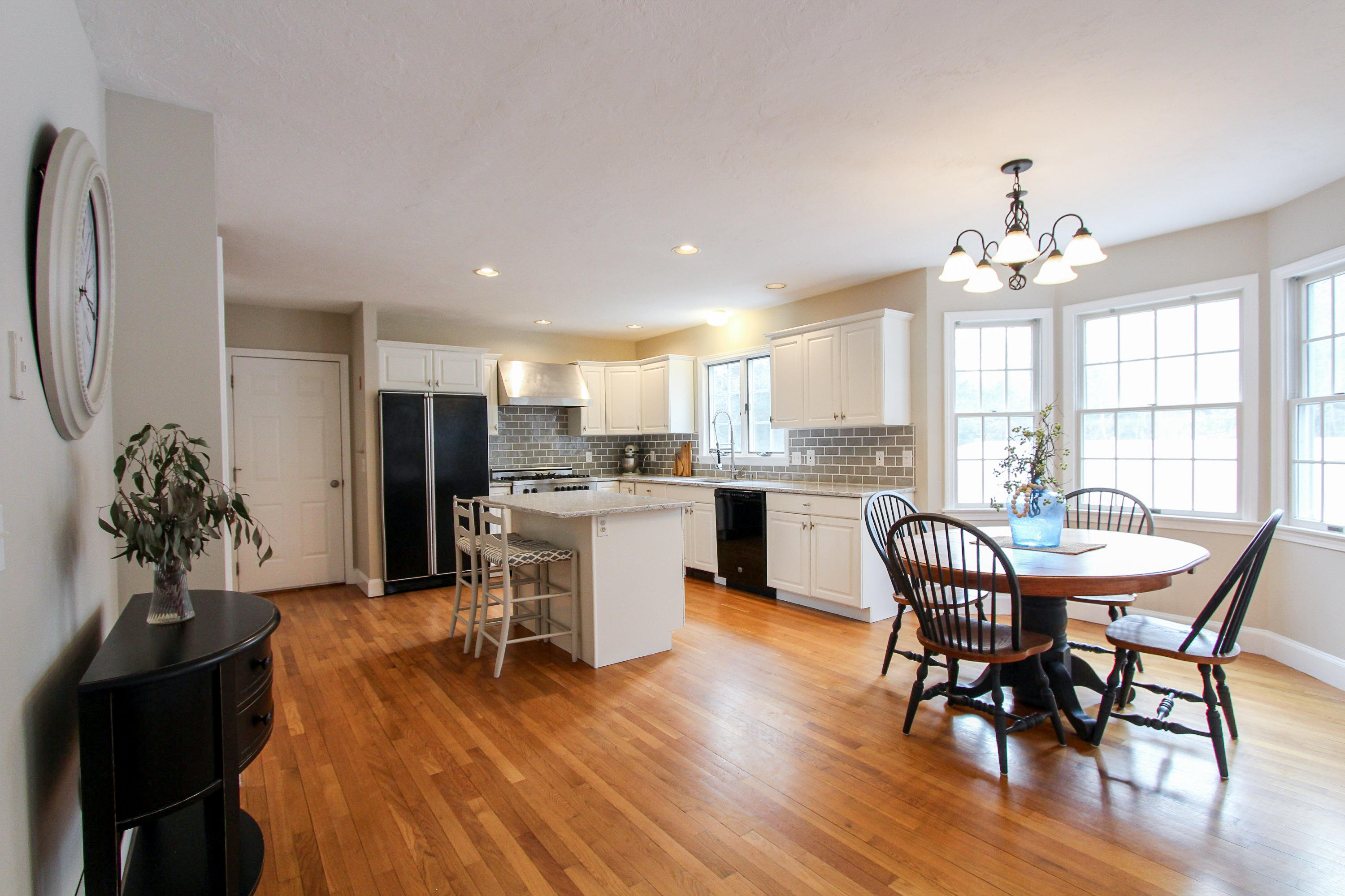 29 Schooner Drive Cotuit, MA 02635 - Photo 6 of 35 a dining room with furniture and wooden floor