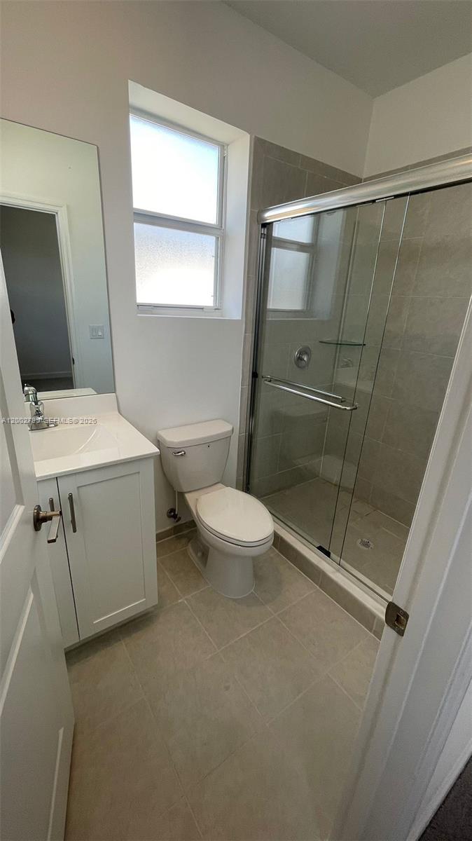 1844 Southeast 27th Street Homestead, FL 33035 - Photo 9 of 23 a bathroom with a sink a toilet and shower