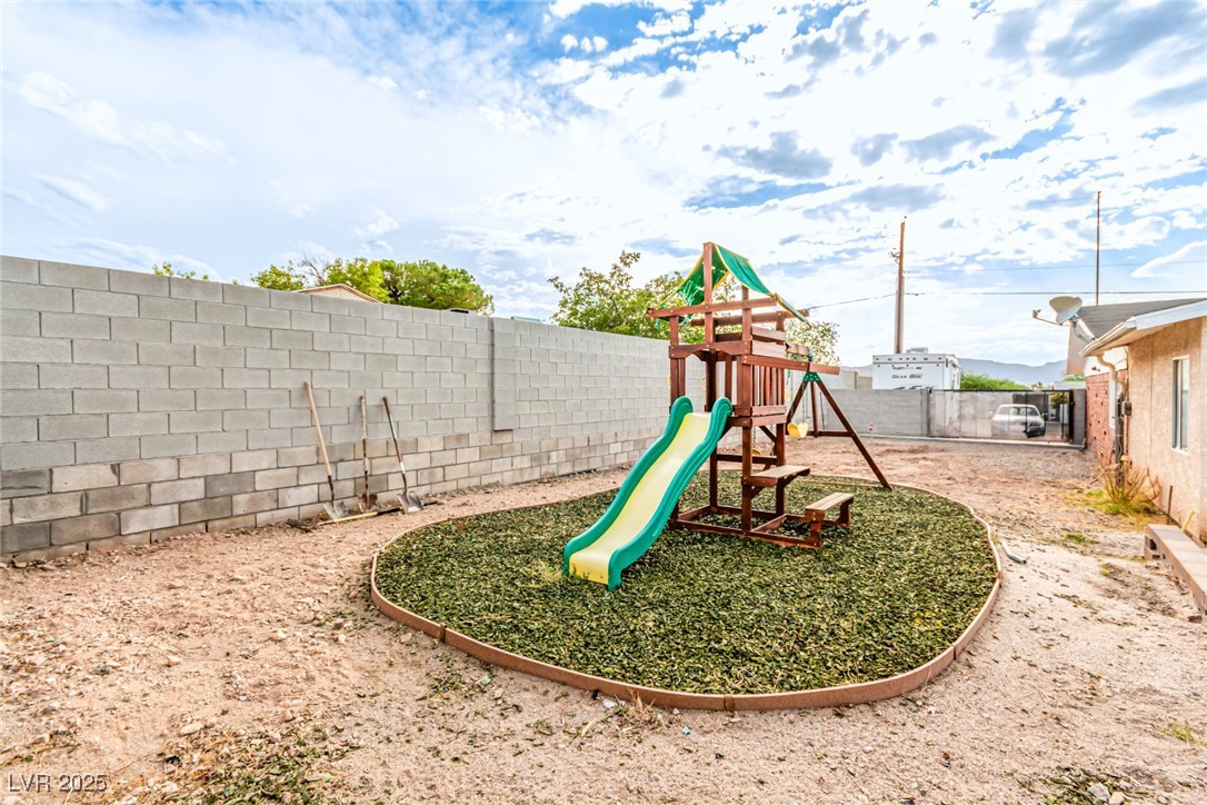 2120 Thoroughbred Road Henderson, NV 89002 - Photo 34 of 57 View of play area featuring a fenced backyard. and RV parking(Fenced)