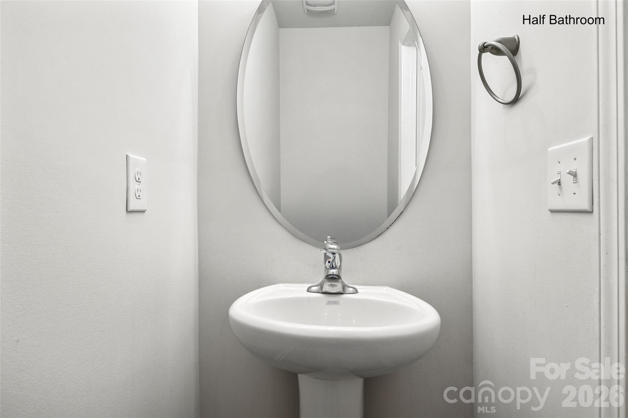 463 West Barr Street Lancaster, SC 29720 - Photo 20 of 43 a bathroom with a sink a mirror and a shower
